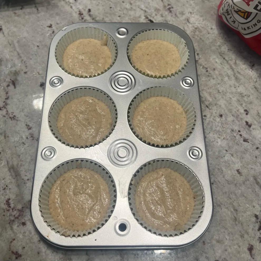 Cupcake batter portioned in liners